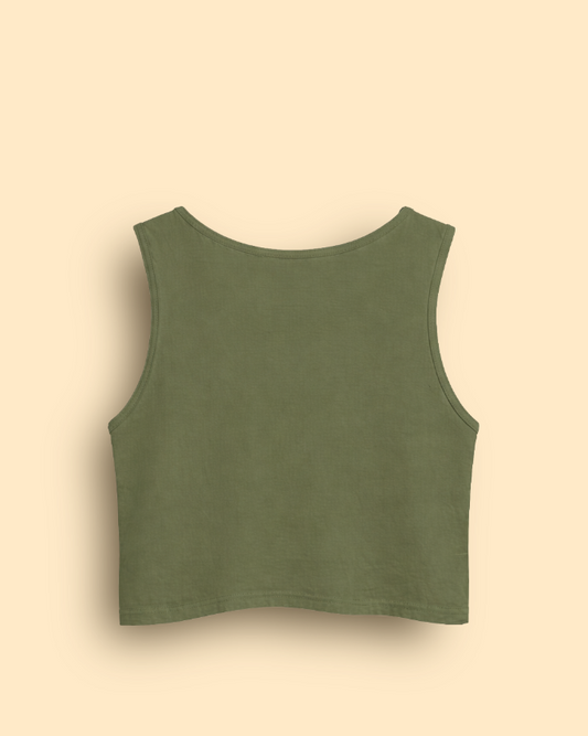 Green tank top on a beige background